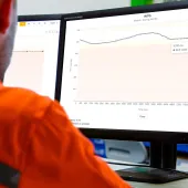 An engineer remotely monitors the cyclic loading of a bolted connection