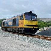 The first train leaving via the newly reinstated rail link at Horton Quarry