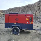 Maa Kripa’s Chicago Pneumatic CPS 550-200 portable air compressor powers drilling and blasting operations in the rugged terrain of Rajasthan, India