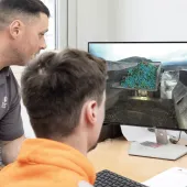 Fragmentation camera analysis of blasted material at a primary crusher tipping point