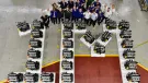 Employees at JCB Power Systems in Foston, Derbyshire, celebrate the production of JCB’s one-millionth engine