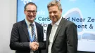 Thomas Guillot, chief executive of the GCCA (left), and German Vice Chancellor and Federal Minister for Economic Affairs and Climate Action, Robert Habeck (right)