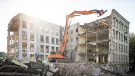 Develon DX380DM-7 demolition excavator in operation 