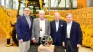 L-R: Sellick Equipment president Colin Sellick, Sellick Equipment co-founder Howard Sellick, JCB chairman Anthony Bamford, and Sellick Equipment co-founder David Sellick 