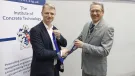 L-R: John Reddy receiving the ICT President’s chains of office from outgoing President Colin Nessfield