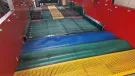 A variety of Remascreen custom screen coverings made from elastomeric materials