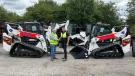 L-R: Malcolm Gough, national hire manager at H.E. Services, and Graham Deacon, national and key accounts sales manager for Doosan Bobcat for the UK and Ireland, with some of the new T76 tracked loaders